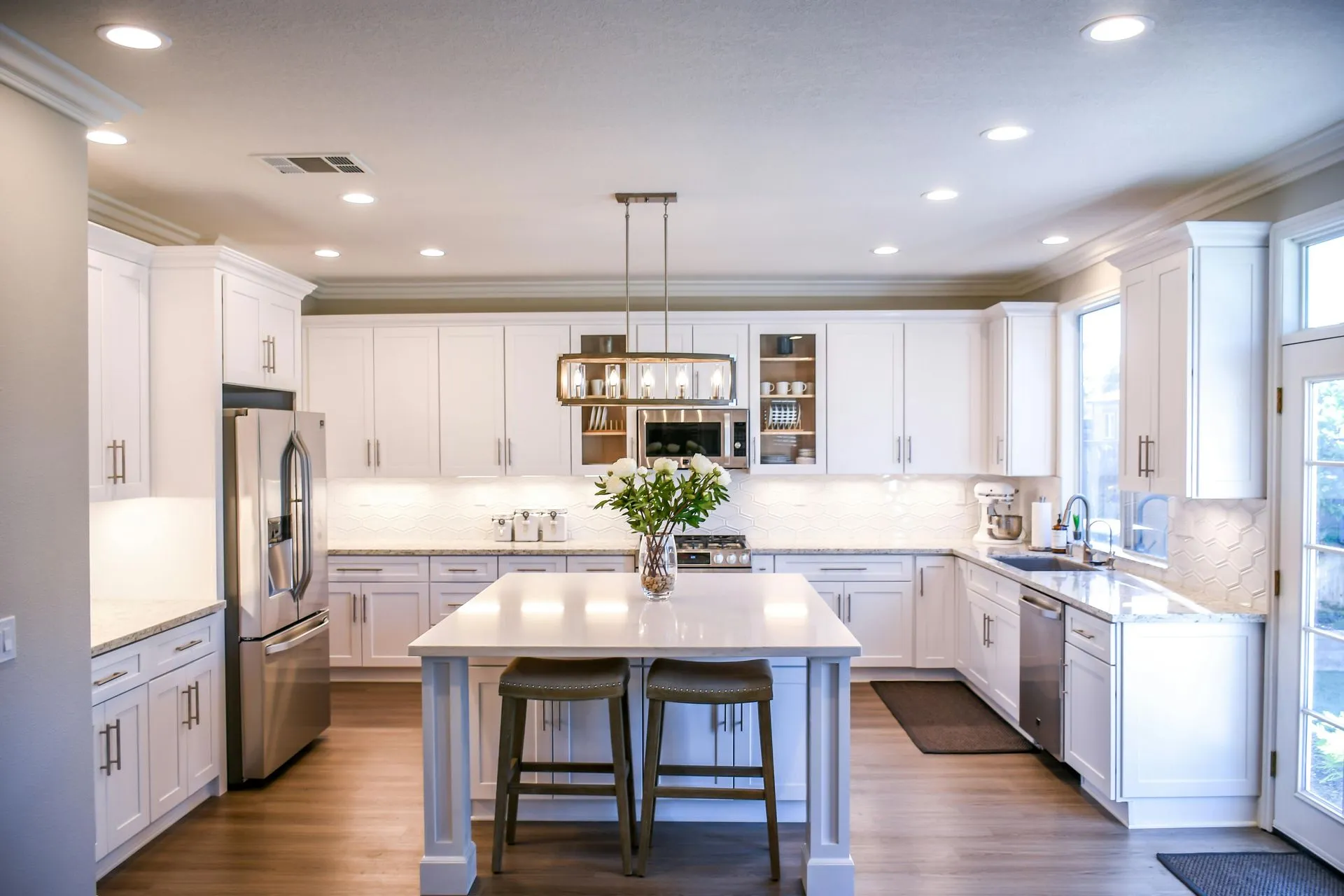 Modern interior with stone countertops and clean finishes used as commercial design inspiration